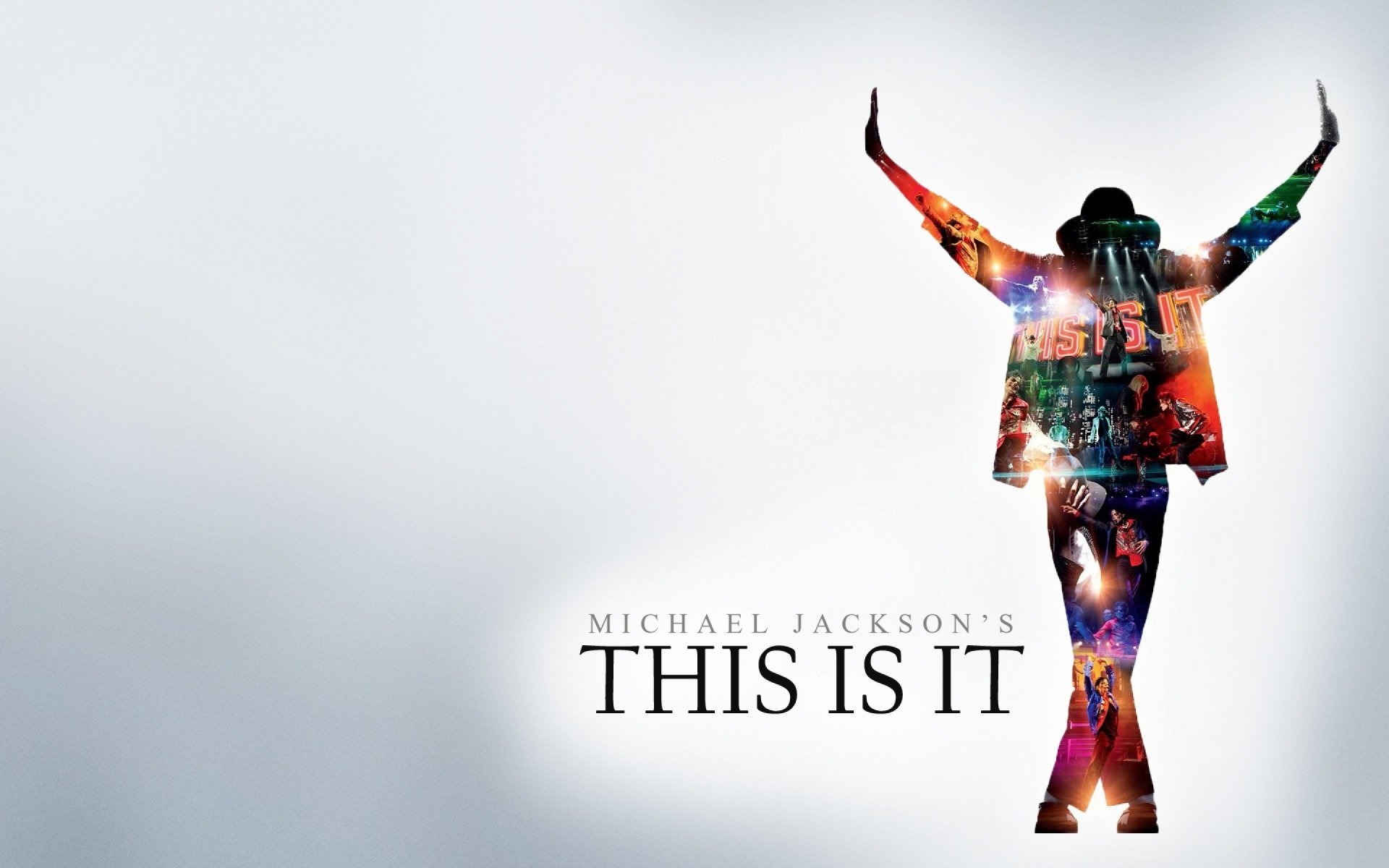 A vibrant HD desktop wallpaper featuring Michael Jackson's silhouette surrounded by colorful visuals, with the text Michael Jackson's This Is It prominently displayed.