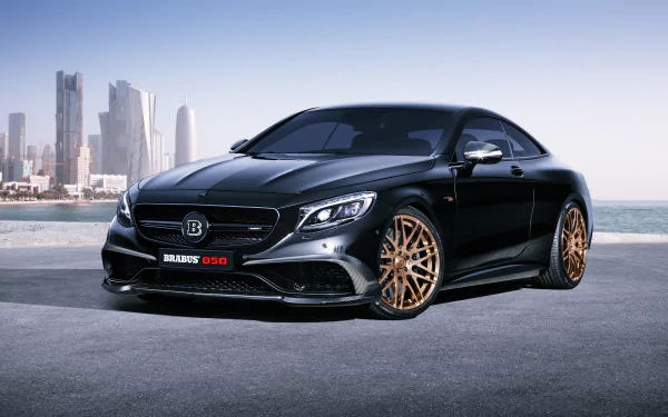 Sleek black Mercedes-Benz Brabus 850 with bronze wheels parked on rooftop, city skyline and ocean in background, captured in sharp 4K Ultra HD detail.