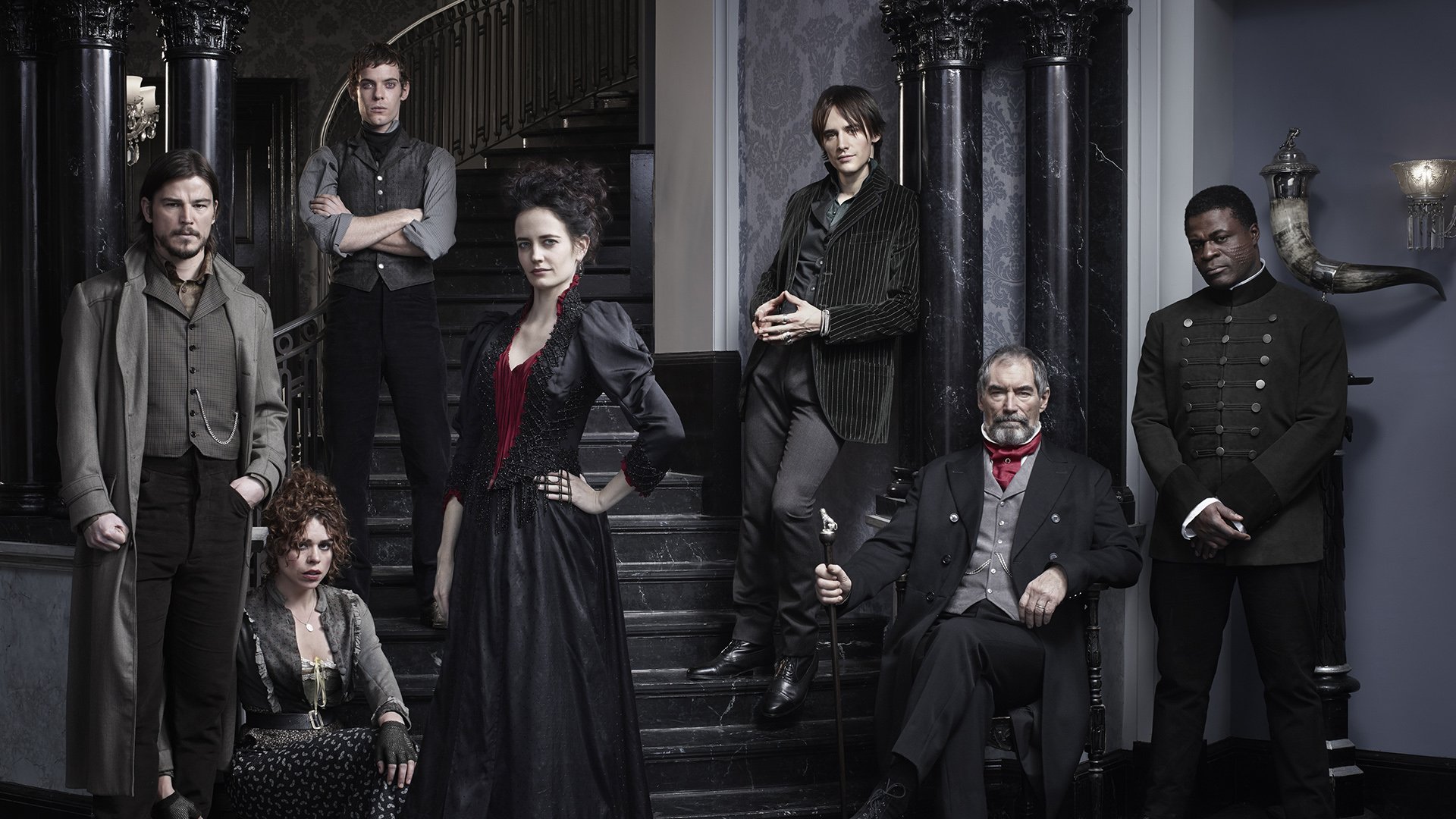 HD PC desktop wallpaper featuring the cast of the TV show Penny Dreadful posed in a dark, Victorian-style interior with dramatic lighting and period costumes.