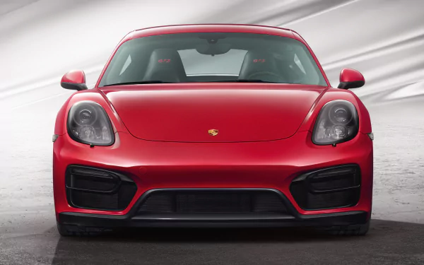 Front view of a red Porsche Cayman GTS vehicle (Porsche Cayman) on a neutral studio backdrop — HD PC desktop wallpaper and background.