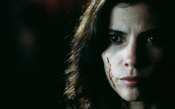 Close-up of Spanish actress Maribel Verdú from the movie Pan's Labyrinth, featured in an HD PC desktop wallpaper and background.