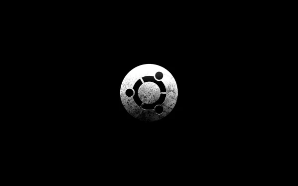 HD wallpaper featuring the Ubuntu logo, set against a dark background. A sleek design that embodies Linux technology and the spirit of open-source innovation.