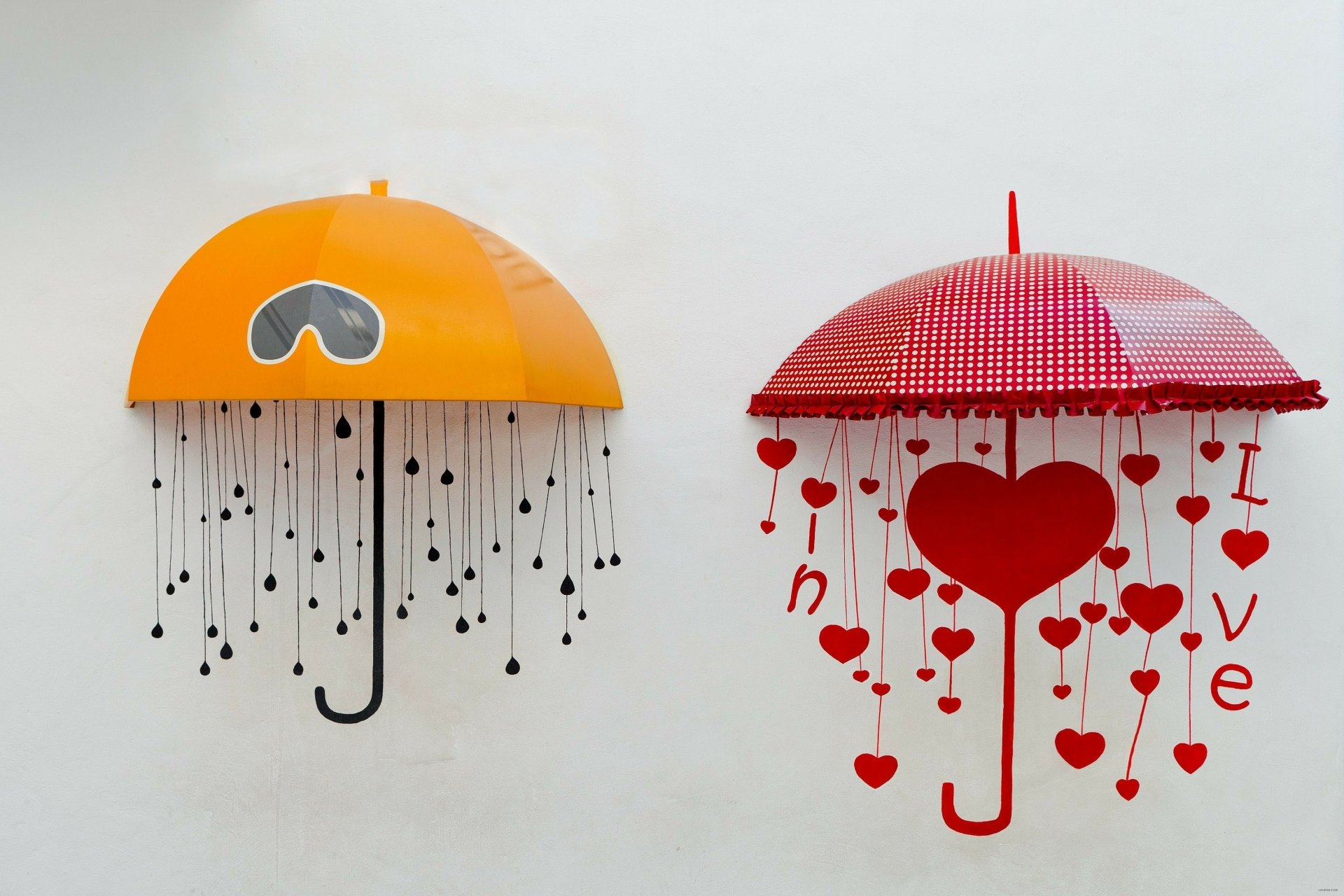 An artistic HD wallpaper featuring two unique umbrellas—an orange one with drops and a red one adorned with hearts, symbolizing love and creativity.