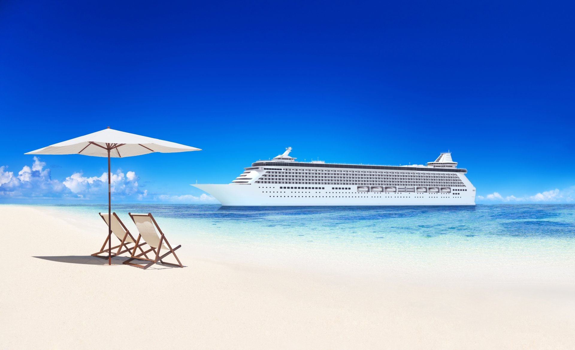 4K Ultra HD desktop wallpaper of a cruise ship sailing on clear blue waters with a sandy beach, two lounge chairs, and a beach umbrella in the foreground.