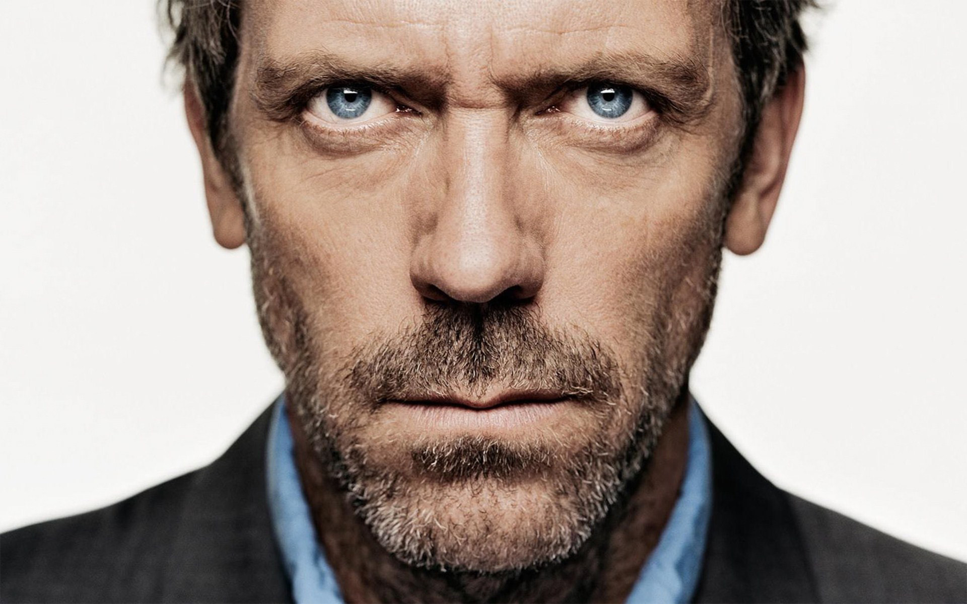 Hugh Laurie portraying the character Gregory House from the TV show House.