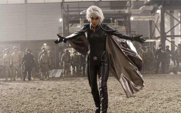 Storm from Marvel Comics stands confidently in a dramatic pose, showcasing her iconic look from *X-Men: The Last Stand*, set against a backdrop of soldiers in a tense scene.