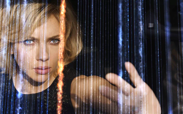 Scarlett Johansson stars in Lucy, depicted in a captivating 4K Ultra HD wallpaper, showcasing her intense expression and futuristic visual effects.