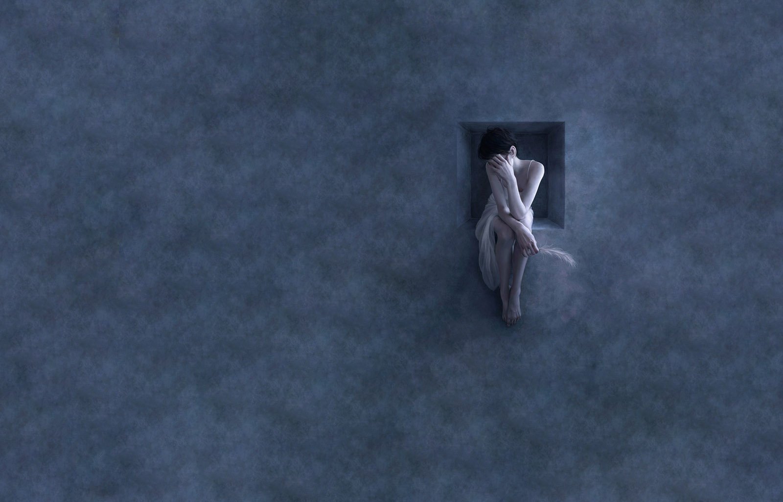 A woman sits in a window against a textured blue wall, conveying an artistic, contemplative mood. This HD wallpaper creates a striking visual for desktop backgrounds.