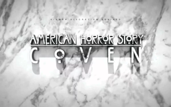 HD PC desktop wallpaper featuring the American Horror Story: Coven logo with a marble background from the TV show.