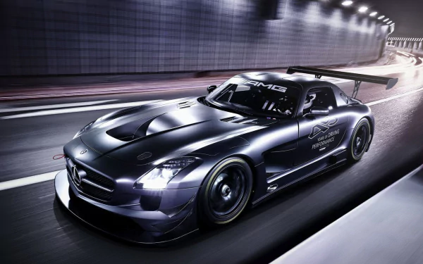 HD desktop wallpaper featuring a sleek black Mercedes-Benz SLS AMG speeding through a tunnel with dynamic lighting and reflections.