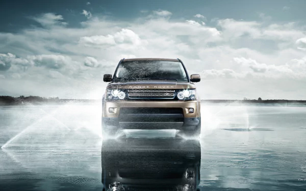 HD desktop wallpaper featuring a Range Rover Evoque driving through water under a cloudy sky, showcasing the vehicle's rugged and stylish design.