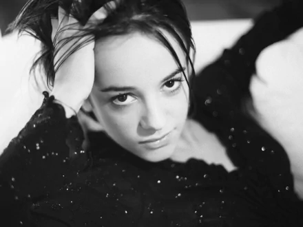 Black and white HD desktop wallpaper featuring a close-up portrait of Alizée, capturing an intimate and artistic music-themed vibe.