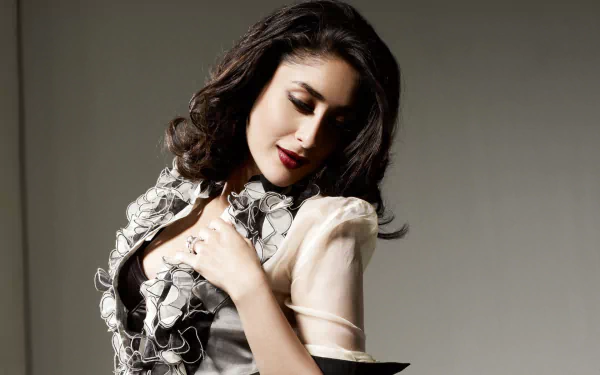 HD desktop wallpaper featuring celebrity Kareena Kapoor in an elegant ruffled outfit, exuding grace and glamour.