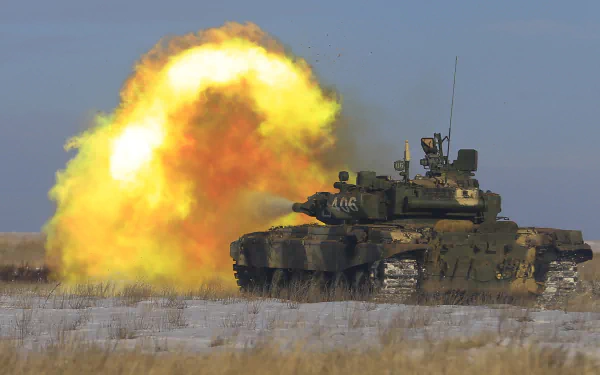HD desktop wallpaper featuring a T-90 military tank firing amidst a smoky battlefield under a clear sky.