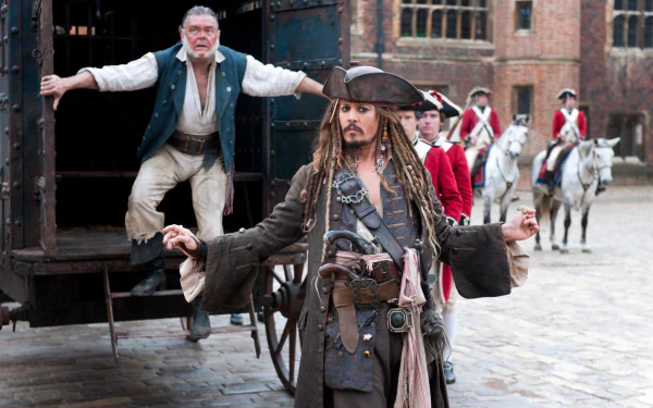 Joshamee Gibbs and Jack Sparrow in a scene from Pirates of the Caribbean: On Stranger Tides. The image captures their iconic characters in a dramatic moment. 4K Ultra HD wallpaper.