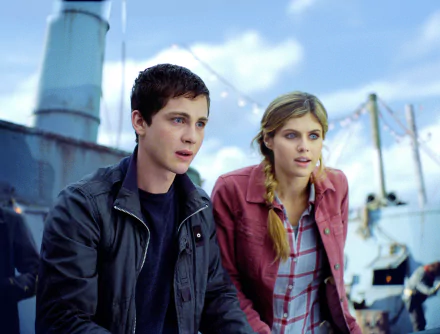 Logan Lerman and Alexandra Daddario in a scene from *Percy Jackson: Sea of Monsters*, captured in a captivating HD desktop wallpaper.