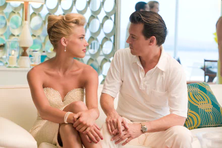 Johnny Depp and Amber Heard in a scene from the movie The Rum Diary, featured in a 4K Ultra HD PC desktop wallpaper and background.