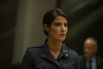 Maria Hill, portrayed by Cobie Smulders, stands determined in a military-style outfit from *Captain America: The Winter Soldier*. This image serves as a striking 4K Ultra HD desktop wallpaper.