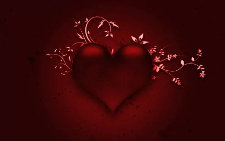 HD desktop wallpaper showcasing an artistic heart with floral designs, evoking a sense of love, set against a deep red background.