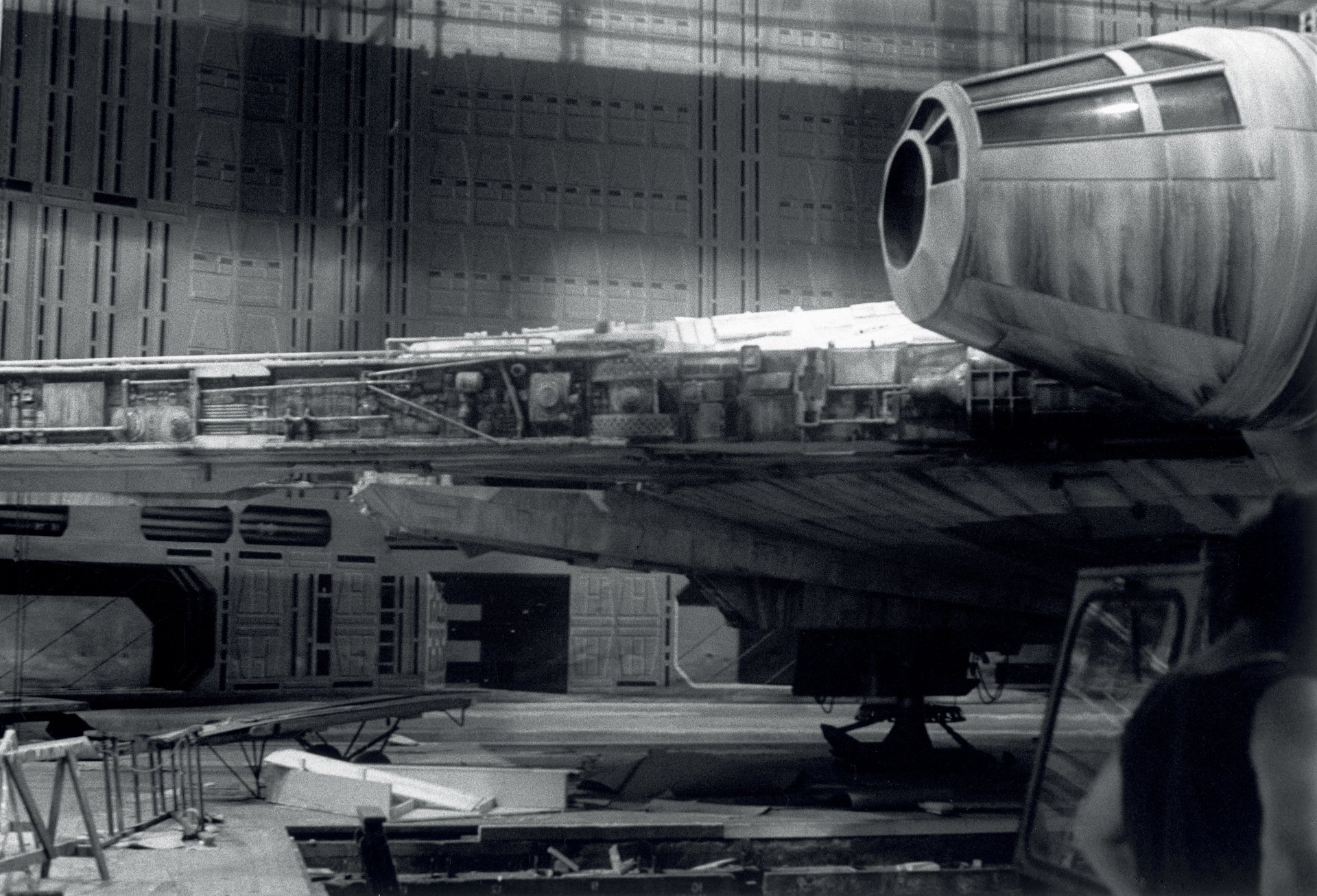 4K Ultra HD Star Wars movie wallpaper featuring a detailed close-up of the Millennium Falcon in a hangar bay, designed for PC desktop backgrounds.