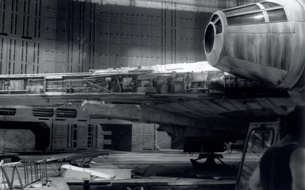 4K Ultra HD Star Wars movie wallpaper featuring a detailed close-up of the Millennium Falcon in a hangar bay, designed for PC desktop backgrounds.