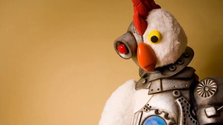 HD desktop wallpaper featuring a robotic chicken character from the TV show Robot Chicken, showcasing its unique design and colorful features against a simple background.