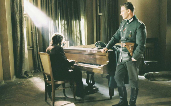 HD PC desktop wallpaper: scene from the movie The Pianist — a man at a piano bathed in light while a uniformed officer stands nearby in a dim, curtained room.