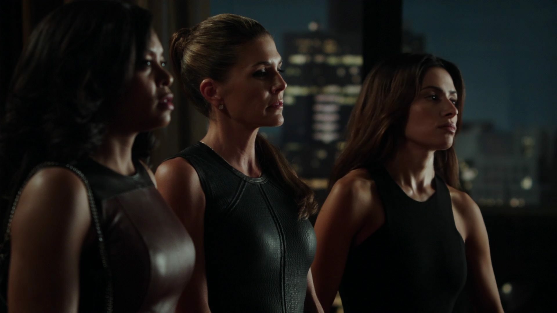 HD PC desktop wallpaper featuring Sarah Shahi and Taraji P. Henson from the TV show Person of Interest, set against a nighttime cityscape backdrop.