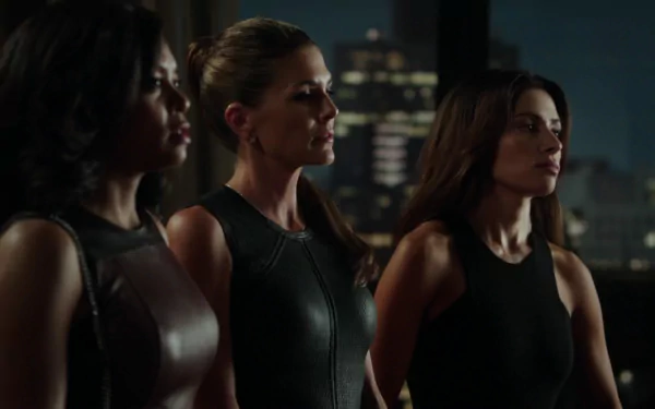 HD PC desktop wallpaper featuring Sarah Shahi and Taraji P. Henson from the TV show Person of Interest, set against a nighttime cityscape backdrop.