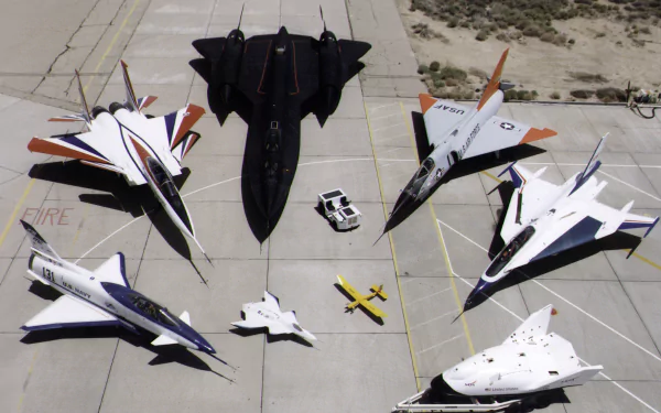A striking collection of iconic aircraft, featuring the General Dynamics F-16 Fighting Falcon, Lockheed SR-71 Blackbird, and McDonnell Douglas F-15 Eagle, set against a desert backdrop.