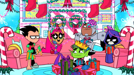 The Teen Titans from Teen Titans Go! celebrate Christmas with festive decorations and gifts. Robin, Starfire, Beast Boy, Cyborg, and Raven are gathered, showcasing holiday cheer in this HD wallpaper.