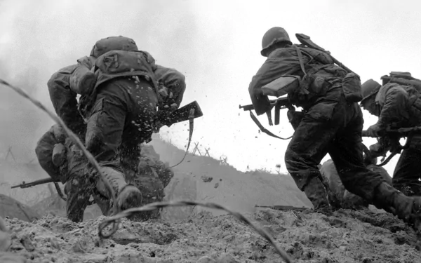 A dynamic black-and-white scene from Saving Private Ryan, depicting soldiers braving the chaos of battle. This HD desktop wallpaper captures the intensity of war.