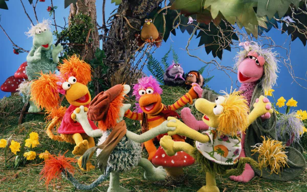 HD PC desktop wallpaper/background showing Fraggle Rock characters from The Muppets TV show dancing among colorful mushrooms and flowers.