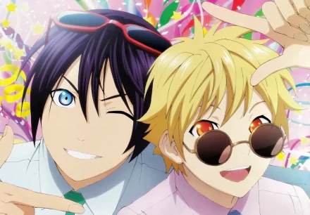 Yukine and Yato from Noragami smile playfully against a colorful background, showcasing their dynamic friendship in this HD anime wallpaper.