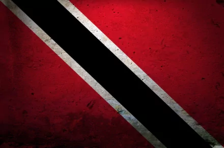 HD desktop wallpaper featuring the textured flag of Trinidad and Tobago with vibrant red, black, and white diagonal stripes.