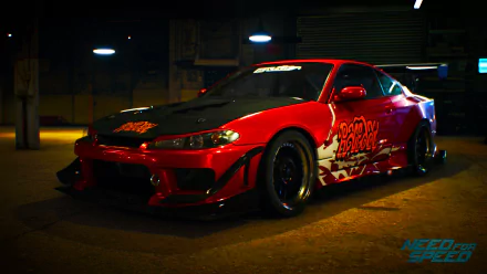 A striking red sports car with vibrant decals, set in a dimly lit garage, captures the intensity of Need For Speed (2015) in this HD PC desktop wallpaper.