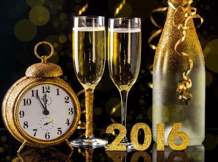 A festive New Year 2016 scene featuring two sparkling champagne flutes, a glittery clock, and a shimmering bottle, all set against a backdrop of golden decorations.
