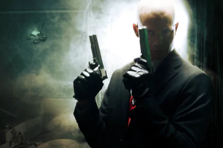 HD PC desktop wallpaper featuring Agent 47 from the Hitman video game, holding two pistols against a dark, smoky background.