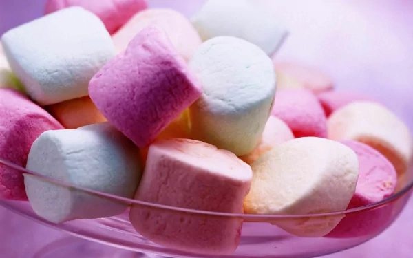 Close-up of pastel pink, white, and peach marshmallows in a glass bowl — food, marshmallow HD PC desktop wallpaper background with soft-focus pastel tones.