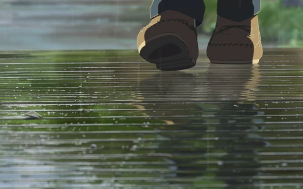 A serene scene from the anime The Garden of Words, featuring a close-up of feet walking on a rain-soaked pathway, reflecting the lush greenery around. HD wallpaper for a tranquil backdrop.