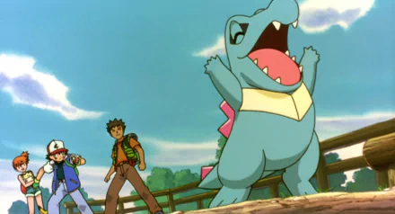 HD wallpaper featuring Ash, Brock, Misty, Totodile, and Togepi from Pokémon 3: The Movie - Spell of the Unown in an anime-style outdoor scene.