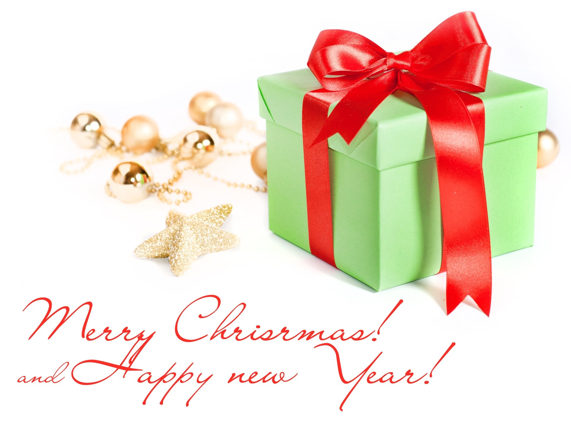 8K Ultra HD holiday desktop wallpaper featuring a green gift box with a red ribbon, gold ornaments, and the text Merry Christmas and Happy New Year! on a white background.