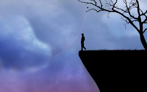 Artistic HD PC desktop wallpaper depicting a solitary human figure standing at the edge of a cliff under a twilight sky with a bare tree nearby.