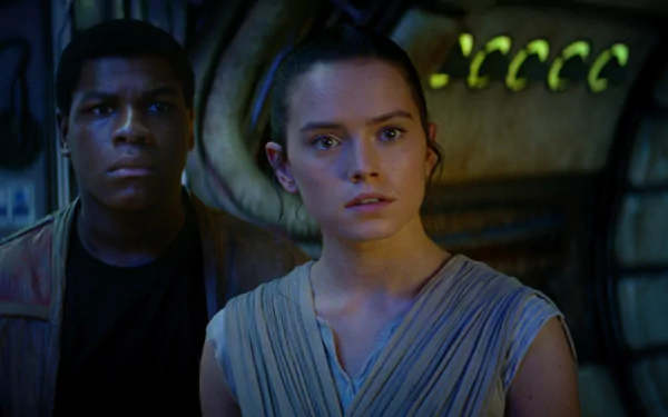 Daisy Ridley as Rey and John Boyega as Finn in a dramatic scene from Star Wars Episode VII: The Force Awakens, featured as an HD desktop wallpaper.
