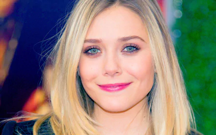 A high-definition desktop wallpaper featuring celebrity Elizabeth Olsen with a warm smile and blonde hair, set against a colorful background.