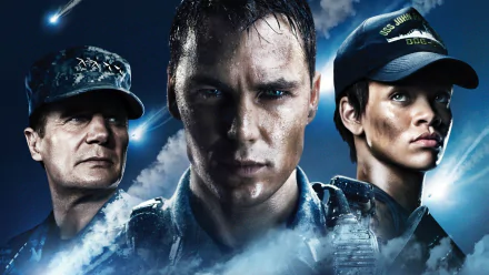 A dramatic HD wallpaper featuring Taylor Kitsch, Liam Neeson, and Rihanna from the movie Battleship, showcasing their intense expressions and a backdrop of chaos.