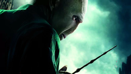 HD PC desktop wallpaper featuring Lord Voldemort from the movie Harry Potter and the Deathly Hallows: Part 1, shown in a dark, eerie greenish atmosphere.