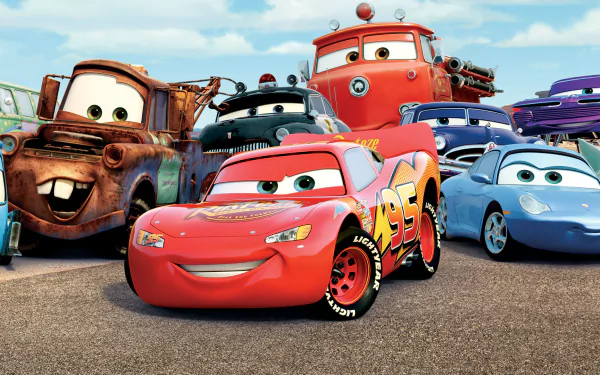 A vibrant HD wallpaper featuring Lightning McQueen, Mater, Flo, Sally Carrera, and other characters from Pixar's Cars, set against a sunny backdrop.