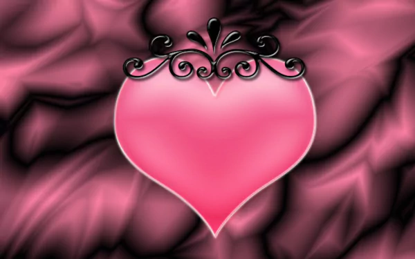 A vibrant HD desktop wallpaper featuring a pink heart adorned with a black crown, set against a soft pink and black backdrop, celebrating love for Valentine's Day.