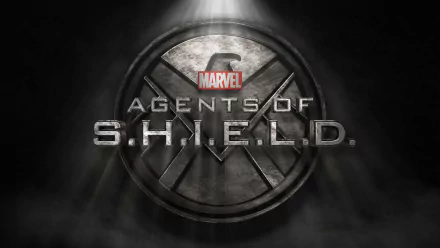 HD PC desktop wallpaper featuring the Marvel TV show Agents of S.H.I.E.L.D. logo with a dark, metallic shield background and dramatic lighting.